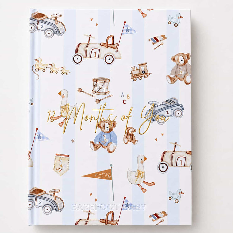 Beary Cute milestone album open showing photo pages